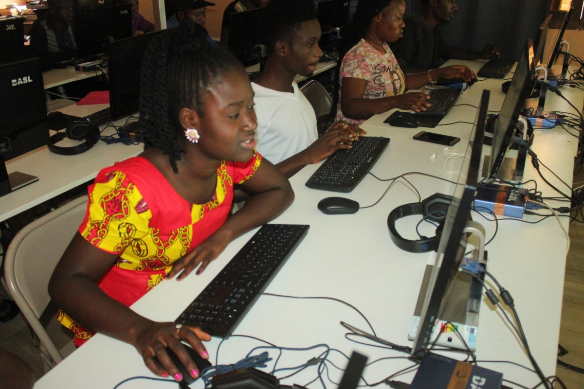 Students learning computer skills