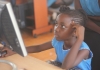 Kid in front of a computer