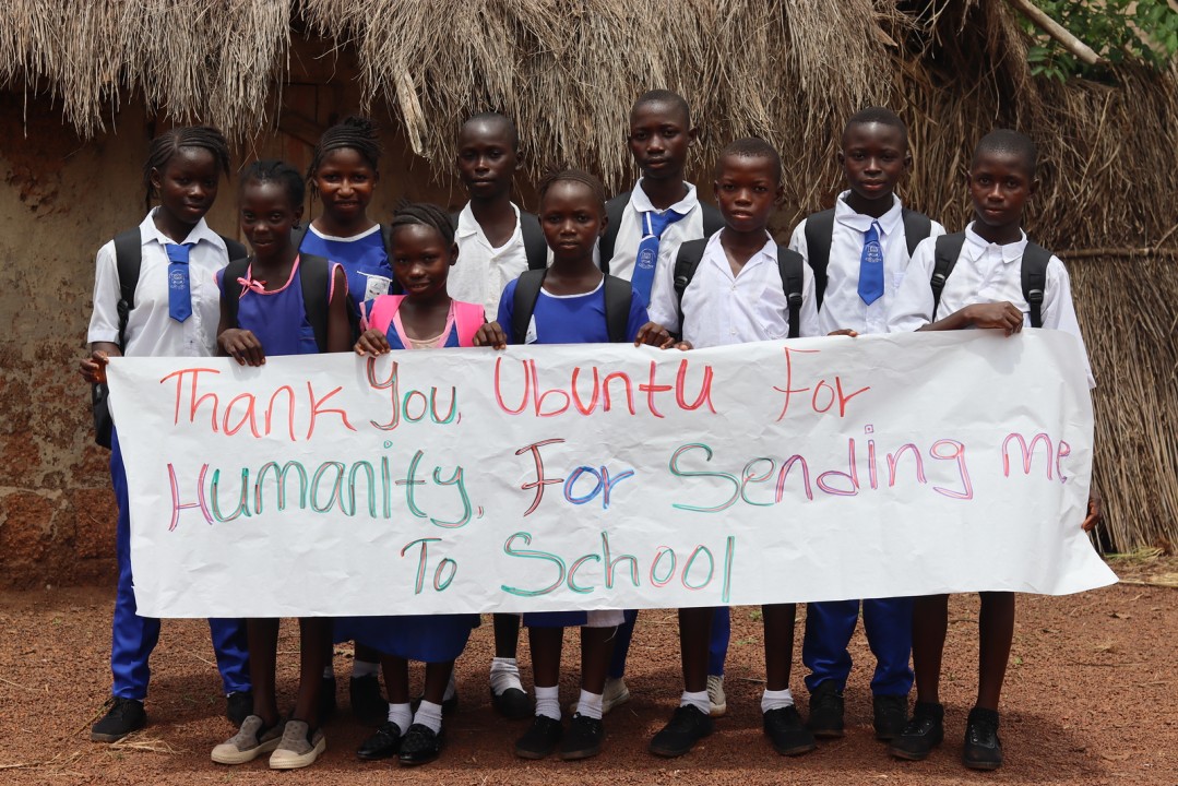 School pupils thanking Ubuntu for sending them to school.