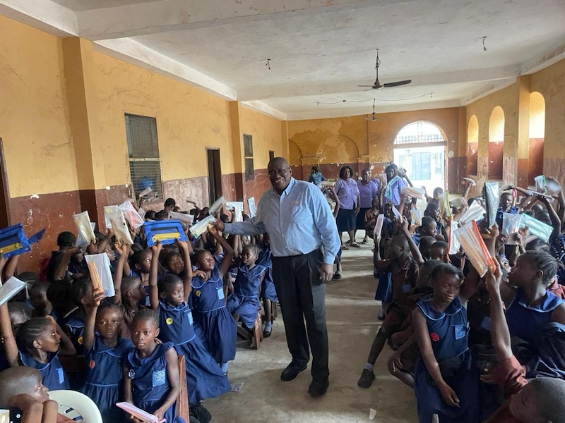 Sylvester with kids - Develop Africa Year of the Pencil Campaign, Sierra Leone, 2025