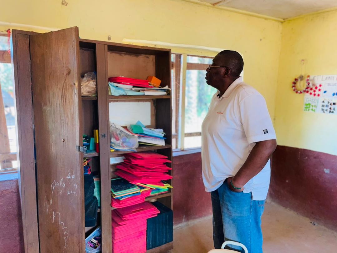 Sylvester, examining the supply room of Kamawornie Nursery School