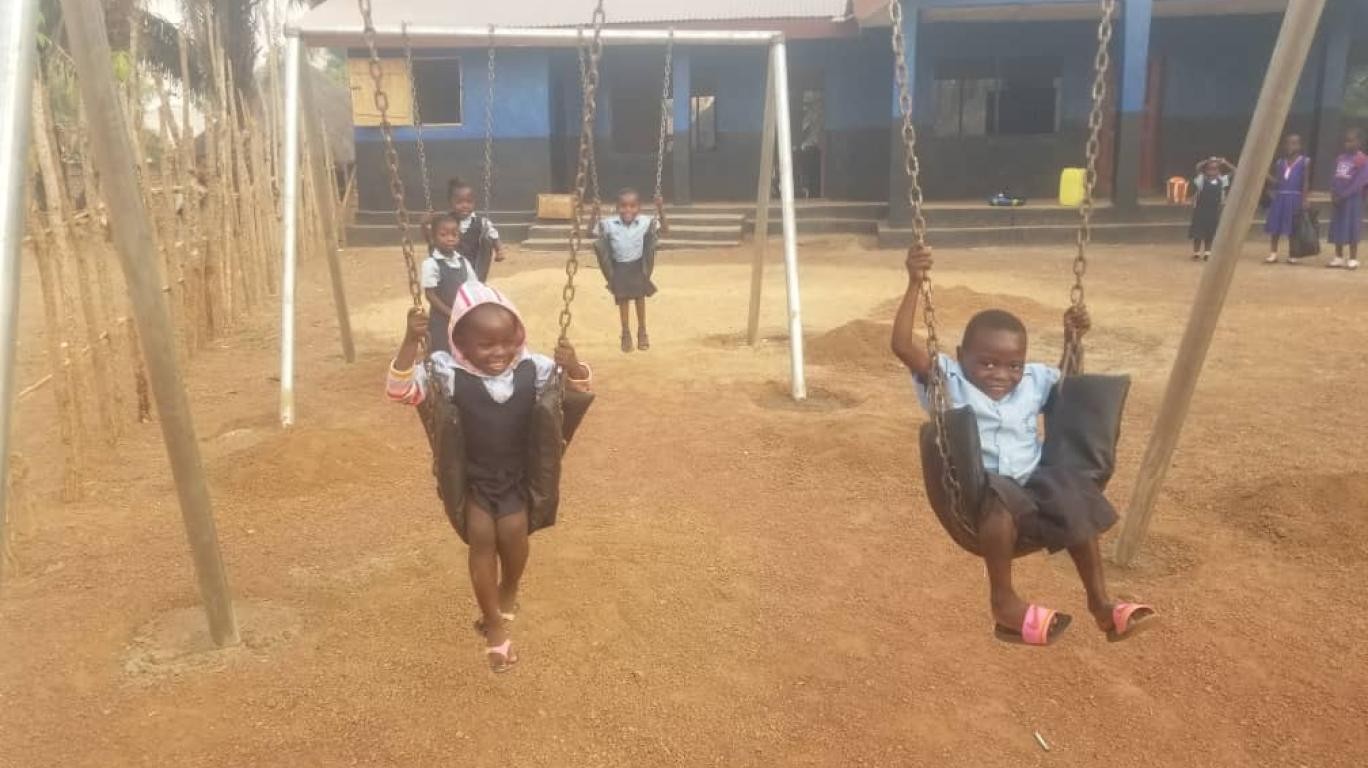 kids playing outside new school