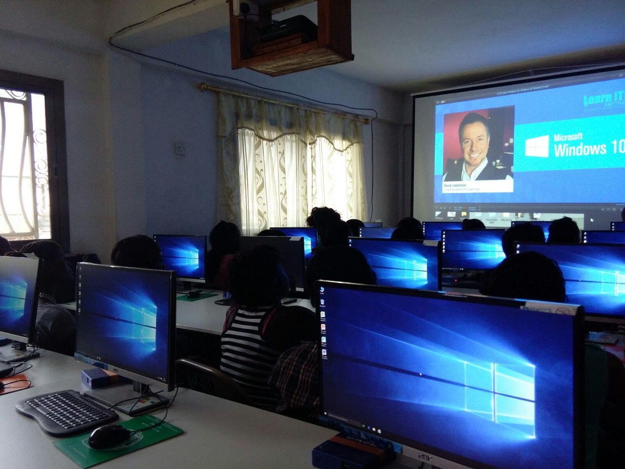 youths learning technology in develop africa sierra leone omputer lab