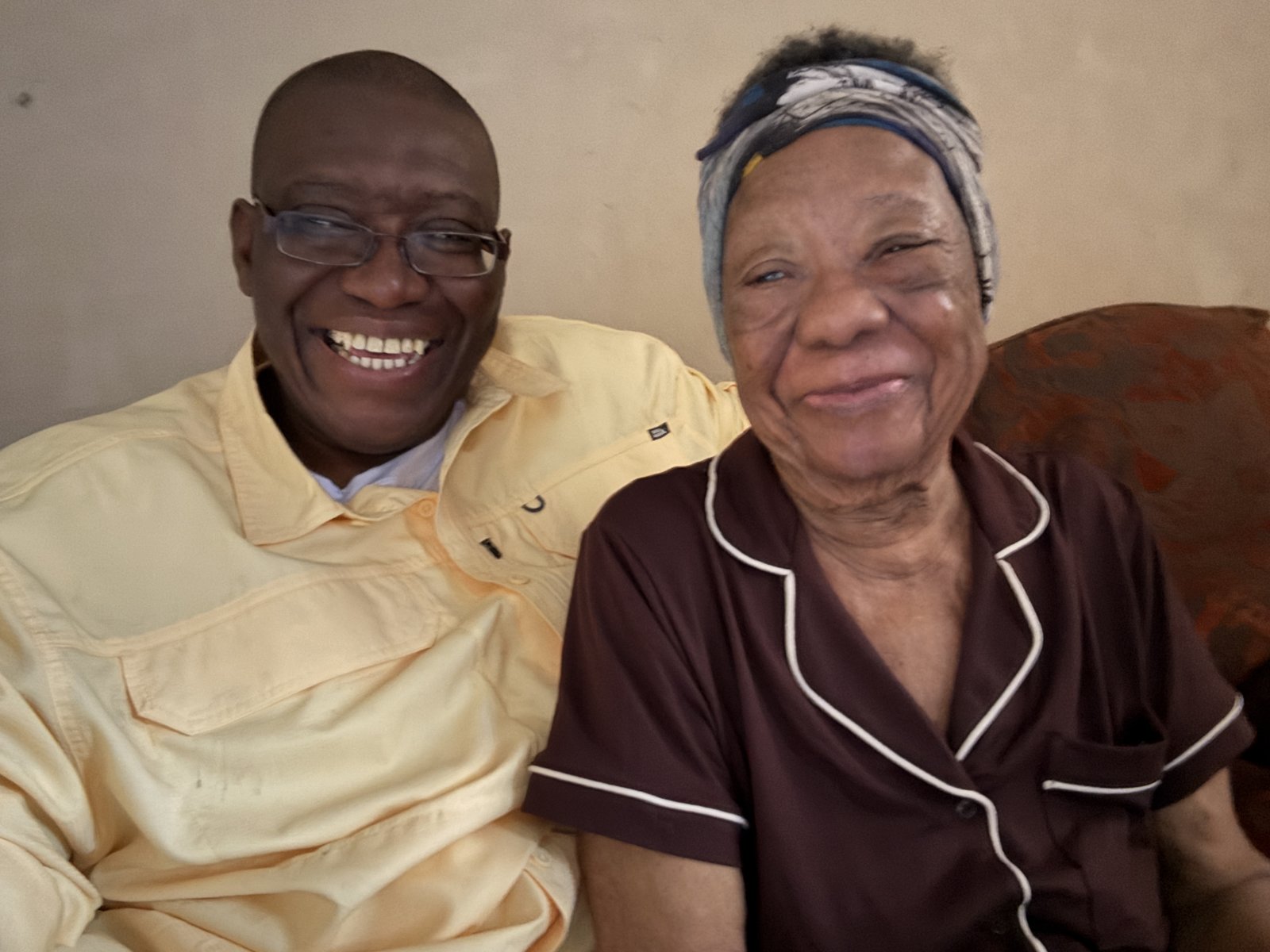 Zainabu Renner and Sylvester laughing together